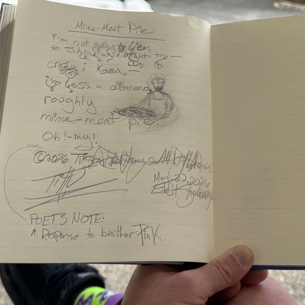 Open notebook resting on someone’s lap outdoors in sunlight. A handwritten poem titled “Mince-Meat Pie” fills the left page with playful, uneven script, flourishes, doodles, and a small sketch beside the lines. The poem references “Shine On You Crazy Diamond” by Pink Floyd and humorously compares the speaker to a “mince-meat pie” instead of a diamond. Neon green and purple socks peek into the bottom left of the image, adding to the whimsical atmosphere.